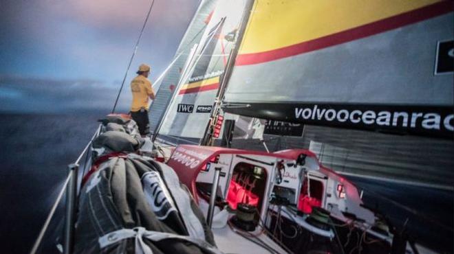 Onboard Abu Dhabi Ocean Racing. Luke Parko Parkinson lights up the trim on the headsails as Azzam heads into a rain squall at night - Leg 4 to Auckland -  Volvo Ocean Race 2015 © Matt Knighton/Abu Dhabi Ocean Racing